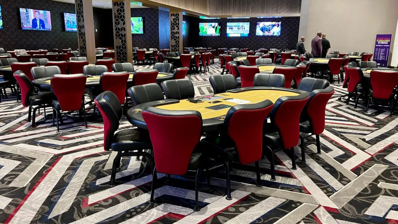 A large room with tables and chairs in it