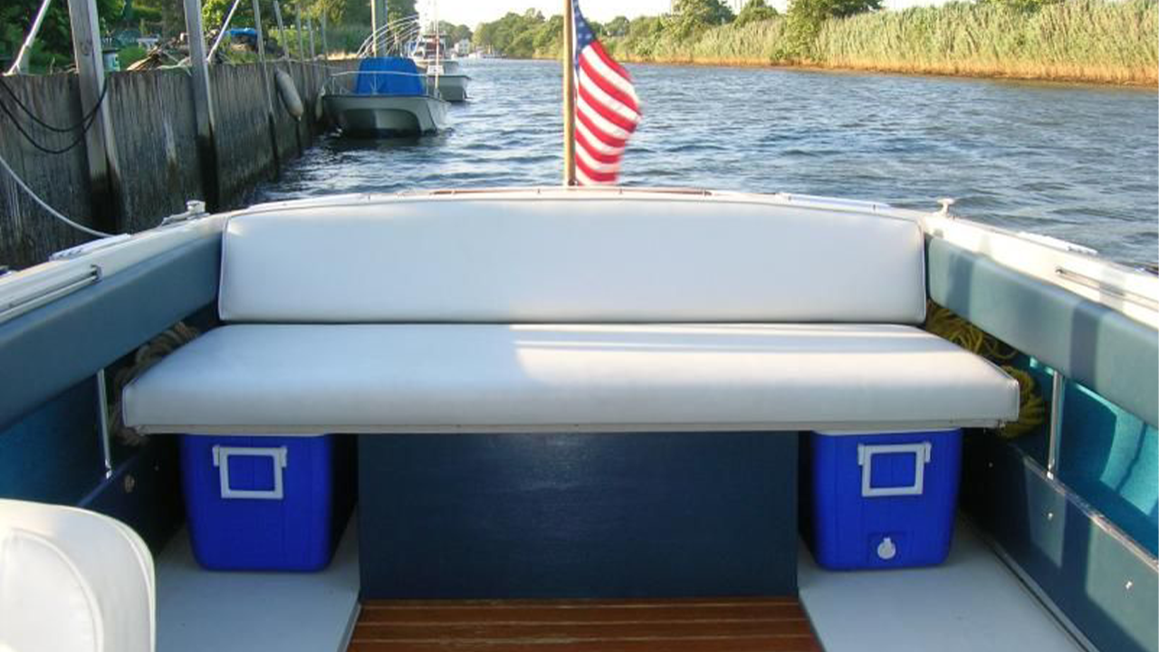 boat A boat with the american flag on it.